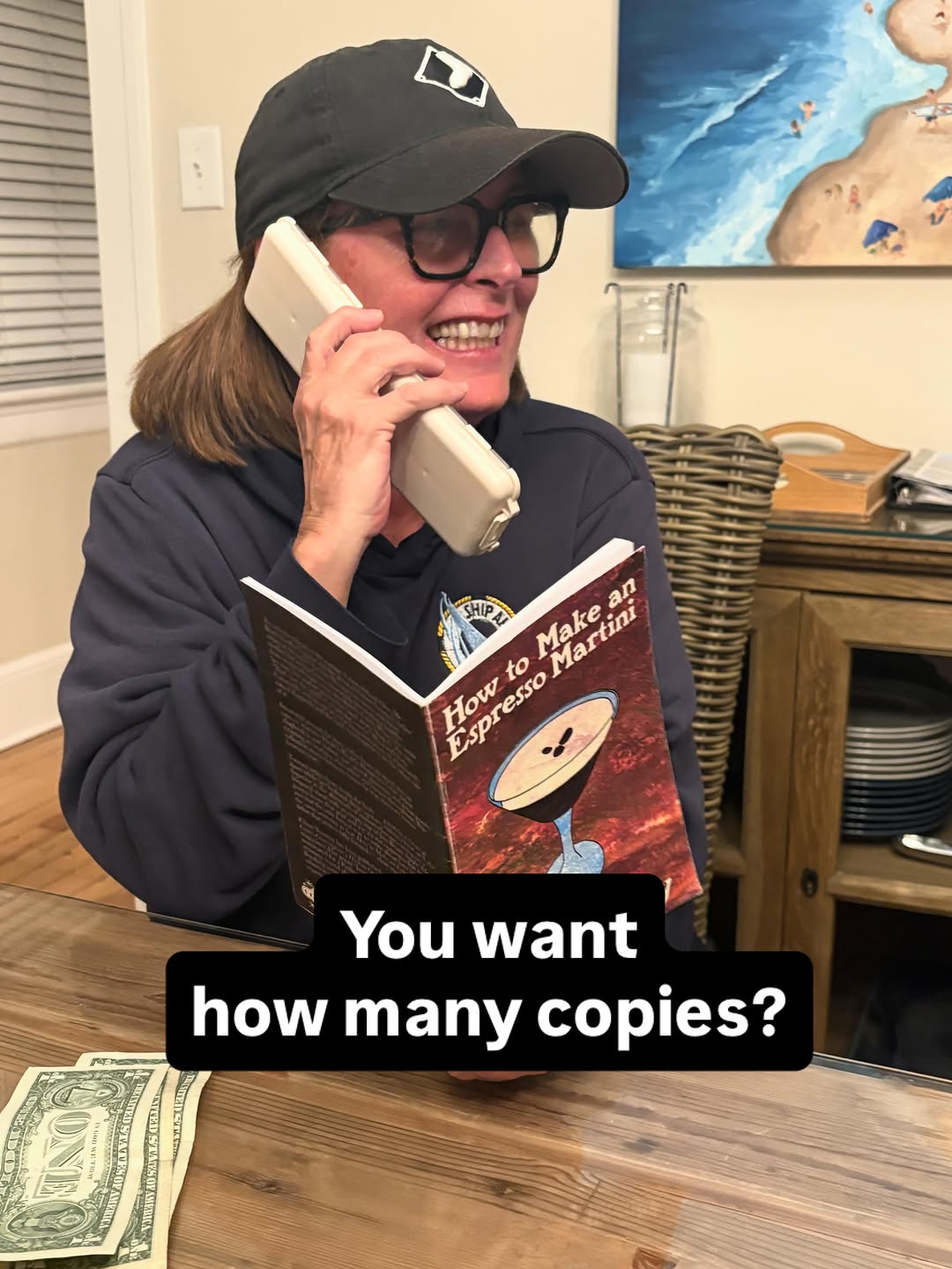 Eileen on the phone with her book